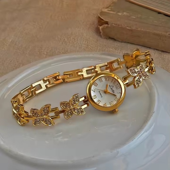 Anthropologie Accessories - Vintage Gold Butterfly Crystal Bracelet Watch